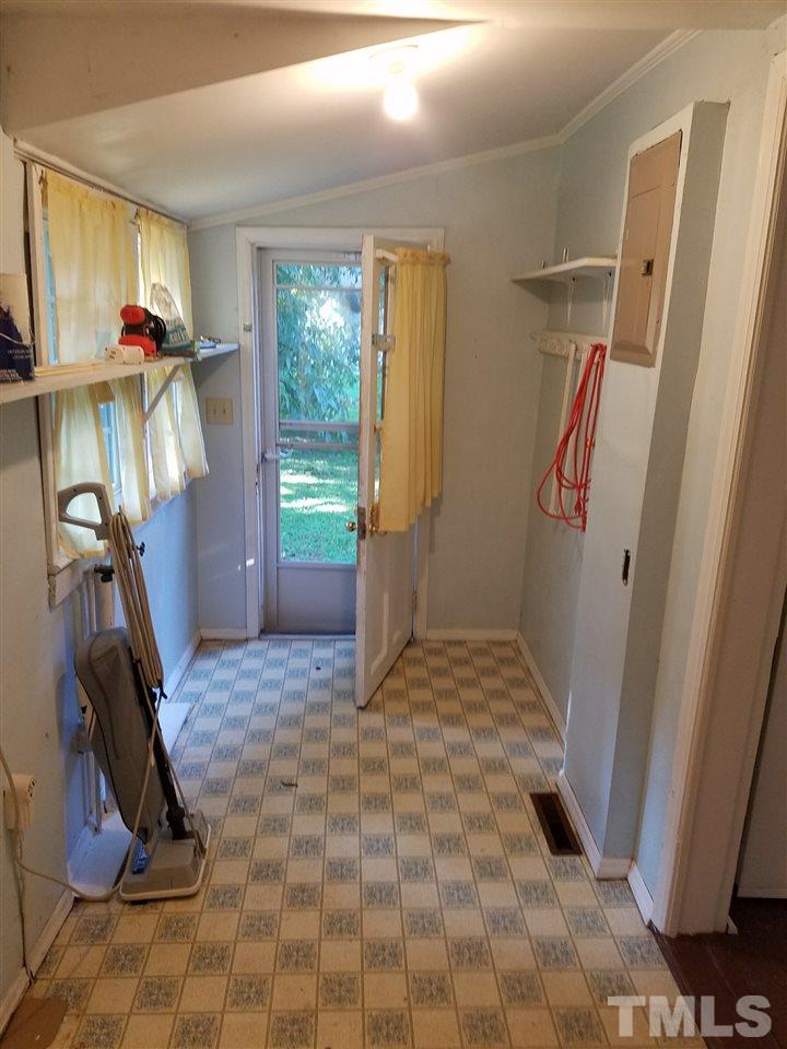 25 Oak Street Roxboro, NC 27573 - Photo 11 of 14 a view of a room with gym equipment