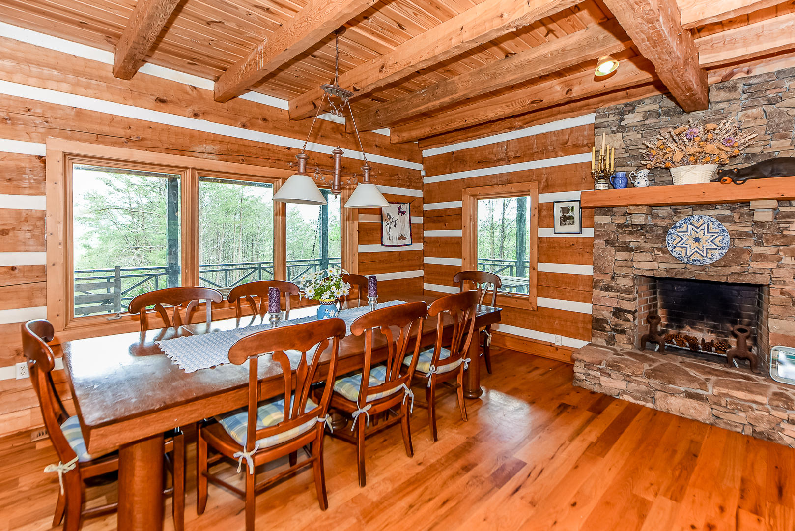155 Tommy Pack Road Townsend, TN 37882 - Photo 13 of 36 Large dining area with stone fireplace