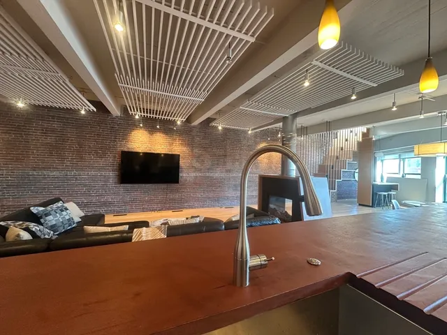 a view of a living room and dining room