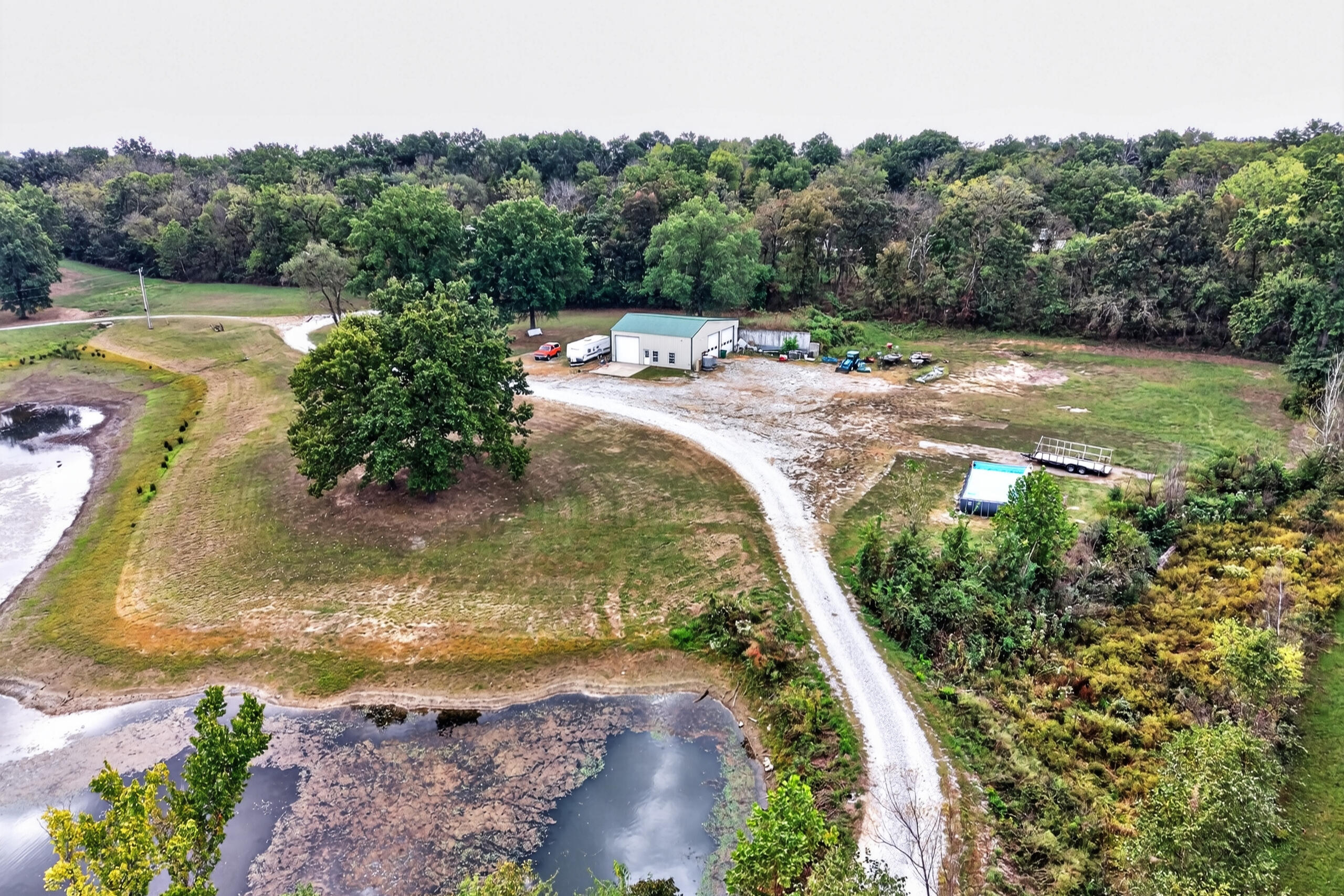973 Southeast Pvt 87 Road Deepwater, MO 64740 - Photo 94 of 120 DJI_20260929103821_0103_D