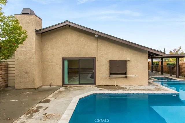 a front view of a house with yard