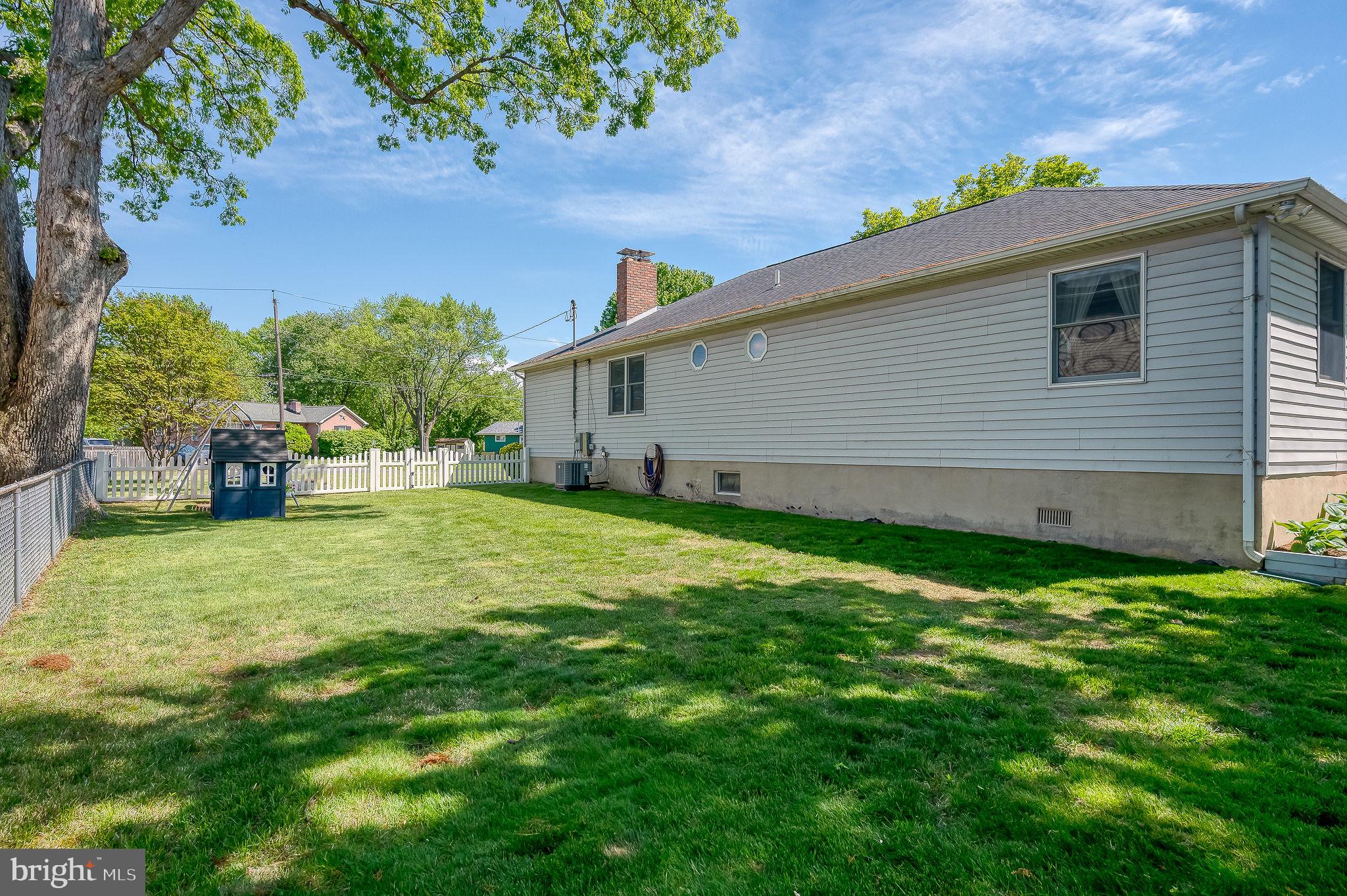2222 Monocacy Road Essex, MD 21221 - Photo 51 of 70 Spacious backyard with lush greenery.