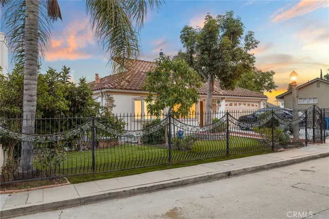 a view of a house with a street