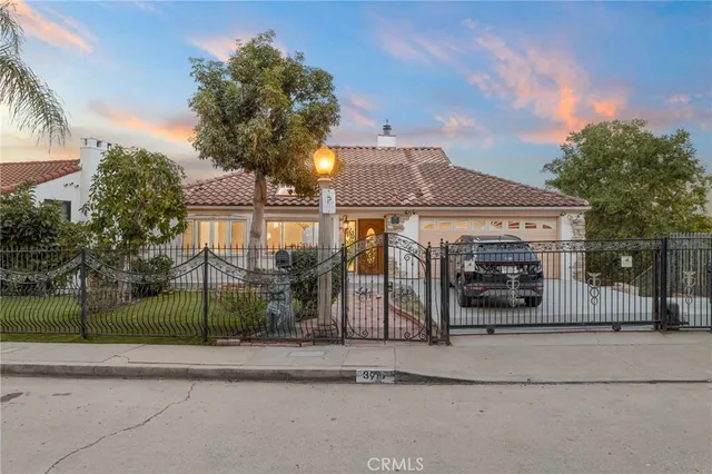 a view of a two chairs on the roof deck