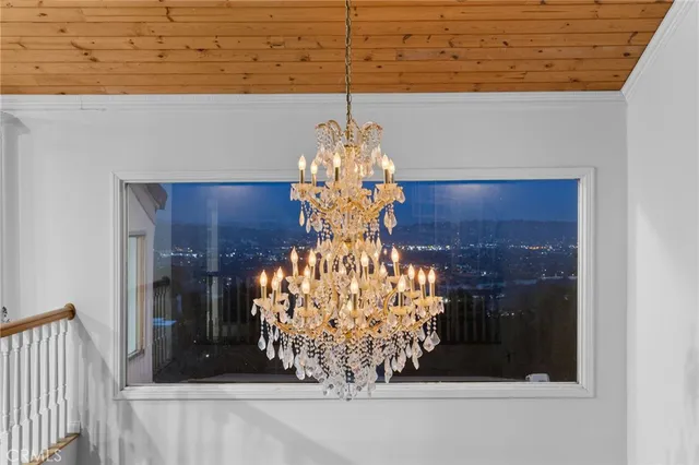 a view of a patio with iron fence