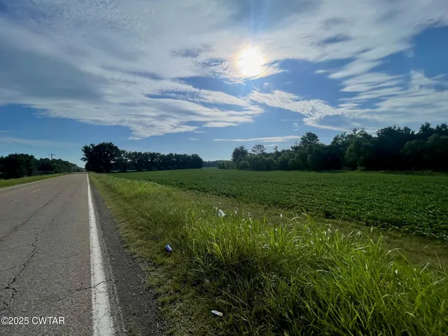 a view of a lake with a big yard