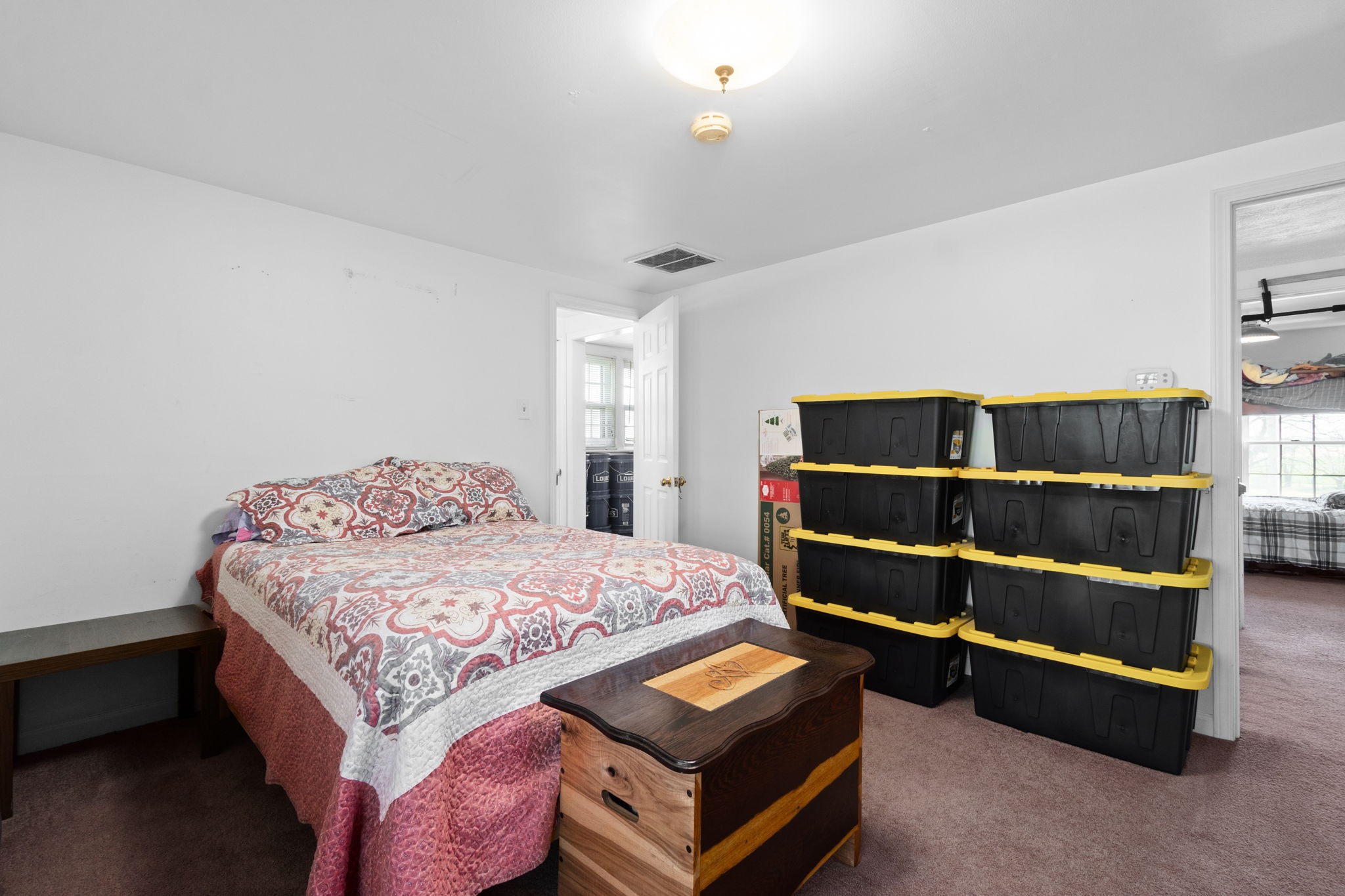 5150 Cadiz Road Hopkinsville, KY 42240 - Photo 32 of 45 a bedroom with a bed and a dresser