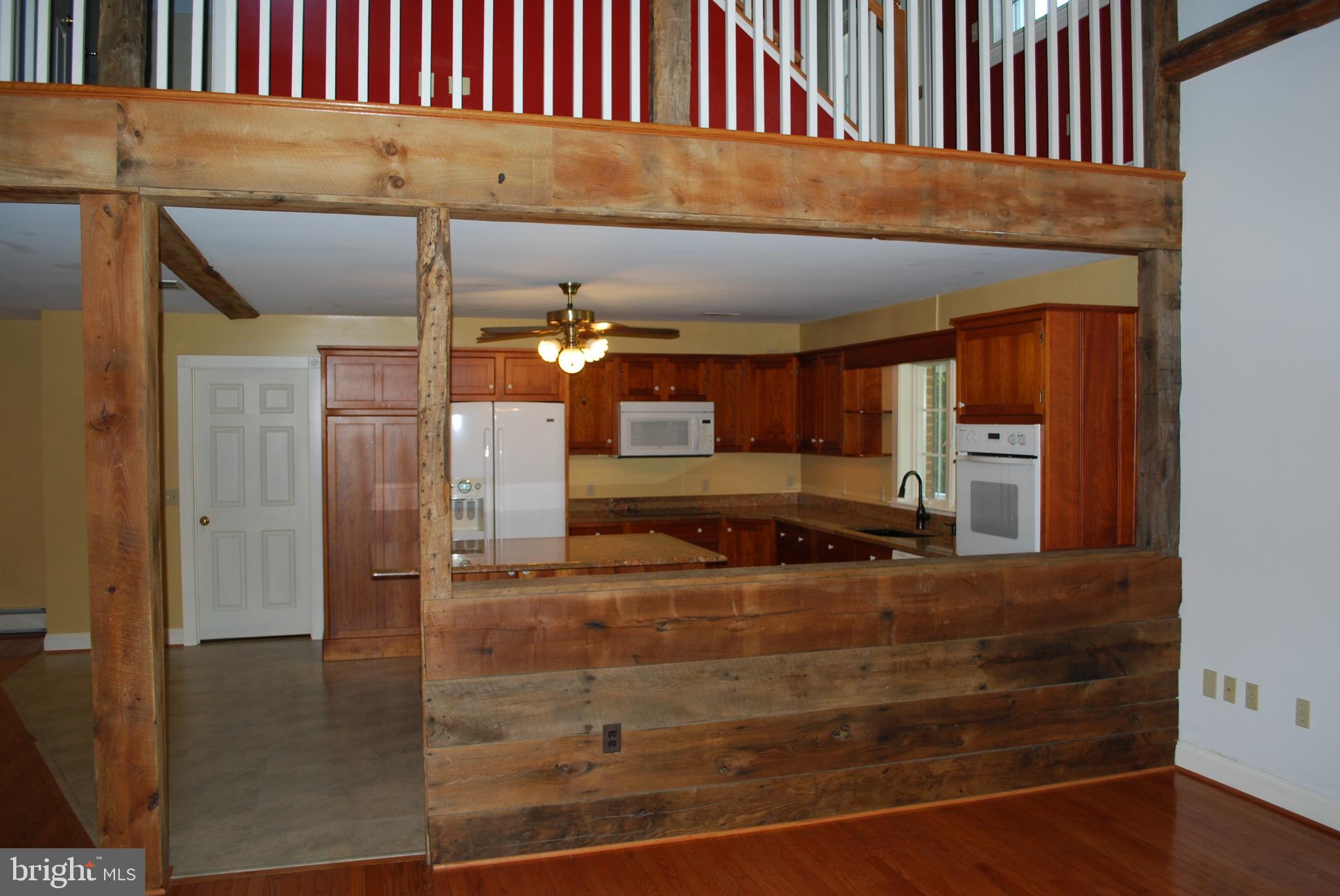 3901 Water Tank Road Manchester, MD 21102 - Photo 15 of 45 View from living room into kitchen