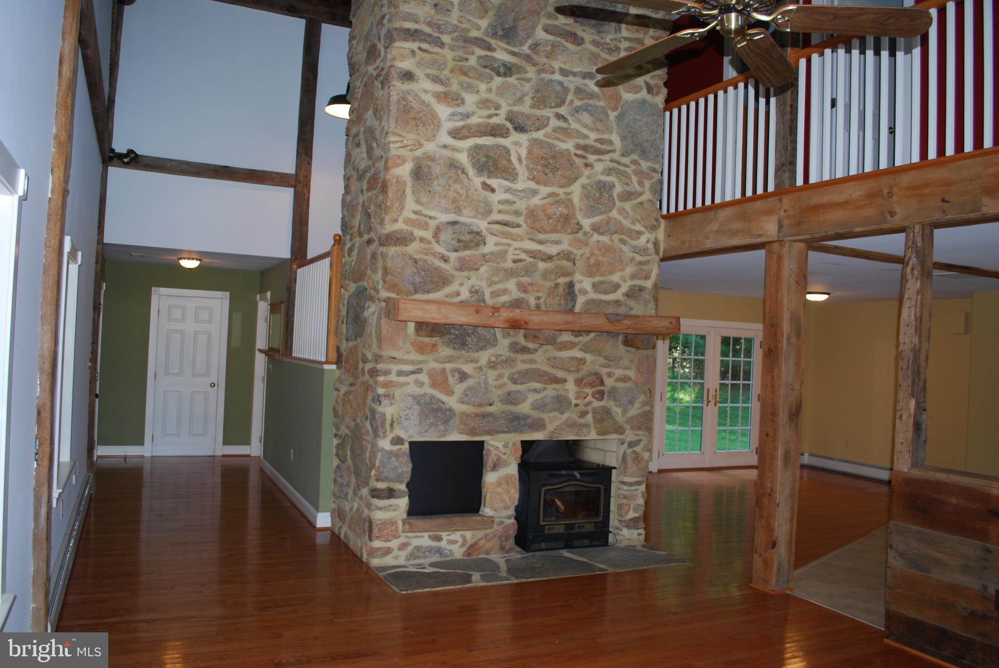 3901 Water Tank Road Manchester, MD 21102 - Photo 17 of 45 Living room area with beautiful stone work
