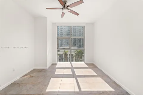 a view of a room with a window