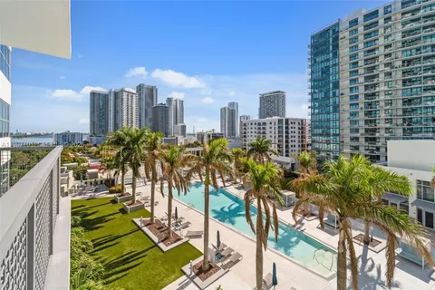 a view of a city with tall buildings