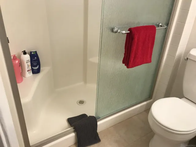 a bathroom with a shower curtain