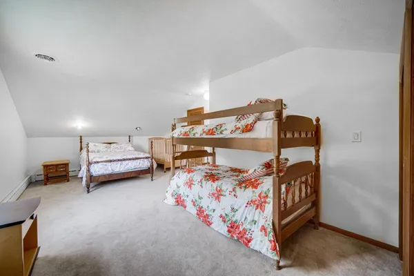 a bedroom with furniture and a couch