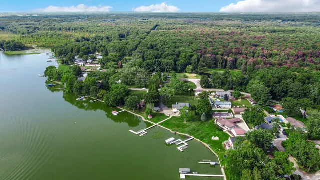 a view of a house with a big yard