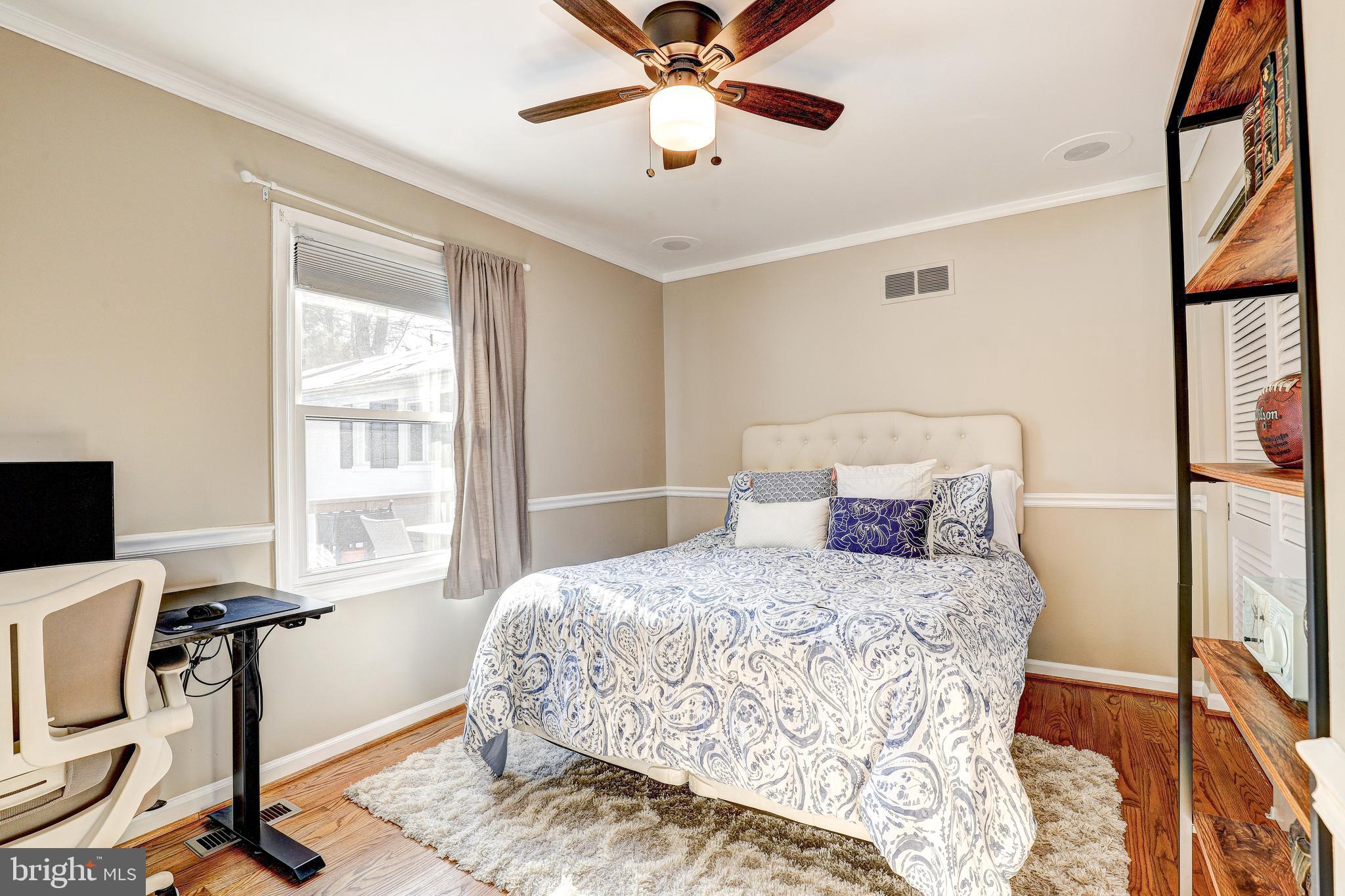 1021 Timber Trail Road Towson, MD 21286 - Photo 41 of 72 a bedroom with a bed and a window
