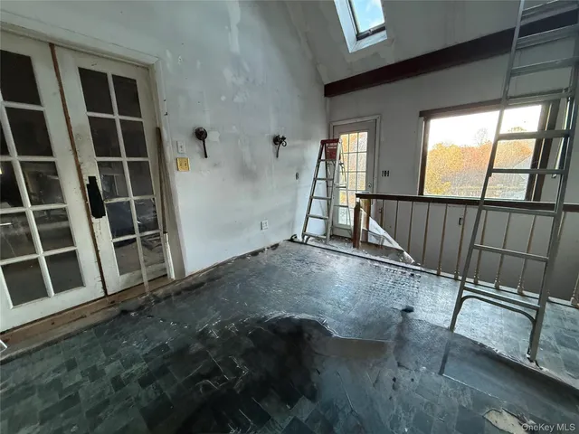 a view of living room with wooden floor