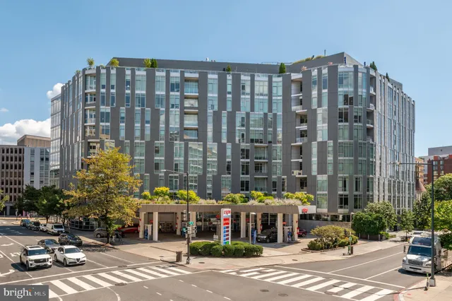 a front view of a building with street view