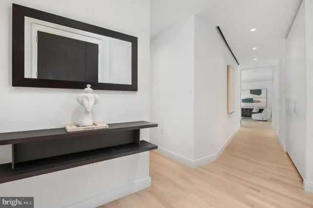 a room with furniture and a flat screen tv