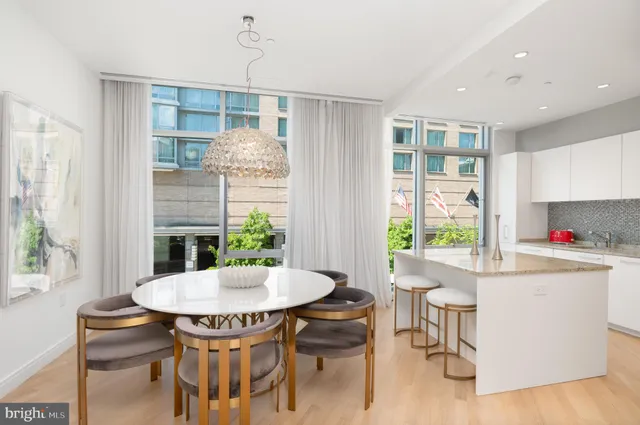 a view of a dining room with furniture window and outside view