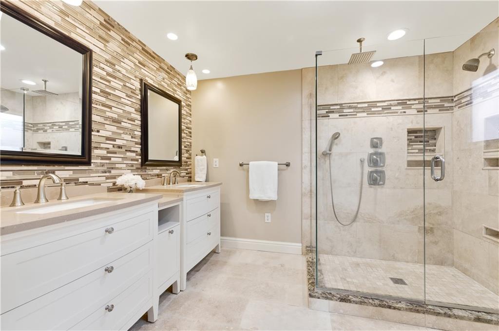 174 North Jamestown Road Coraopolis, PA 15108 - Photo 15 of 27 a bathroom with a double vanity sink mirror and shower