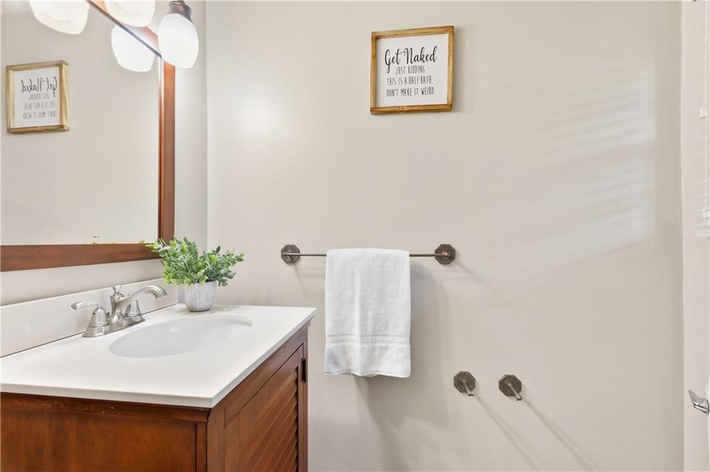 174 North Jamestown Road Coraopolis, PA 15108 - Photo 22 of 27 a bathroom with a sink and a mirror