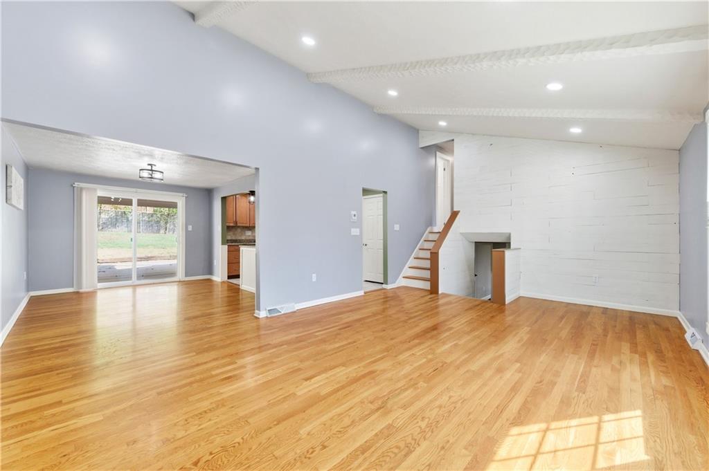 174 North Jamestown Road Coraopolis, PA 15108 - Photo 6 of 27 a view of an empty room with wooden floor and a window