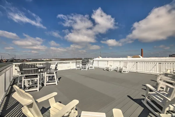 a view of a balcony with an outdoor seating