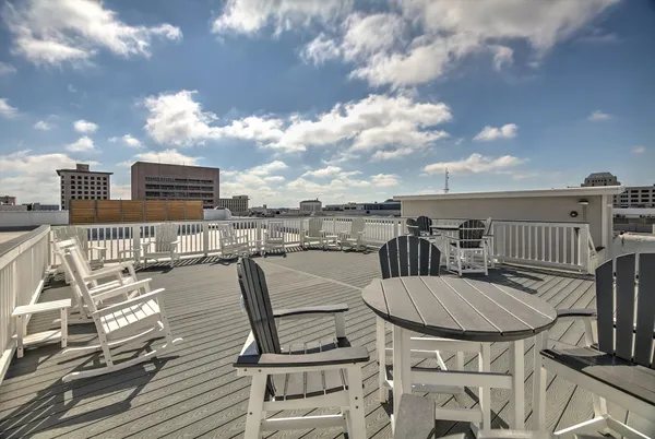 a view of a terrace with furniture and stove