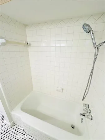 a bathroom with a bathtub