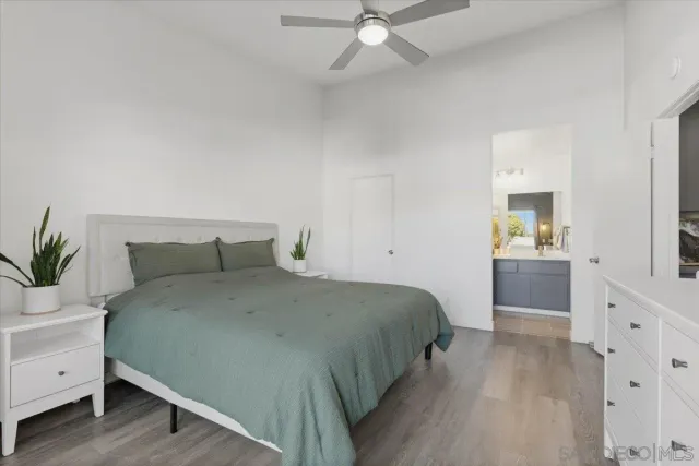 a living room with furniture and a white house