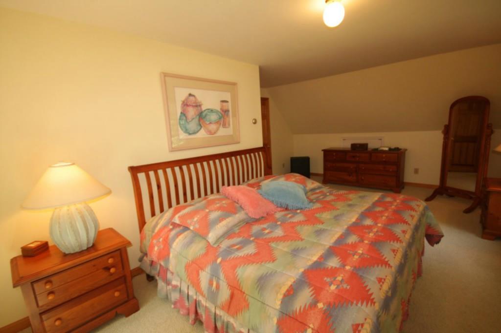 14 Schooner Ridge Road East Boothbay, ME 04544 - Photo 21 of 29 The second floor bedroom, with...