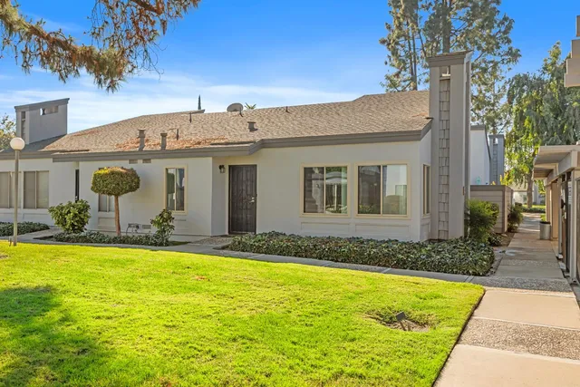 a view of a house with swimming pool