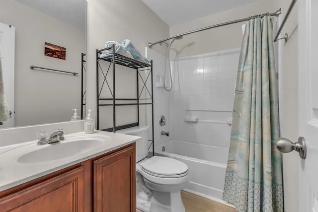 a balcony with table and chairs