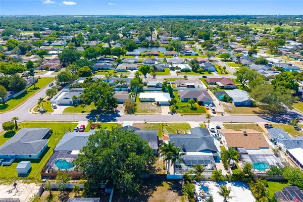 an aerial view of beach and ocean