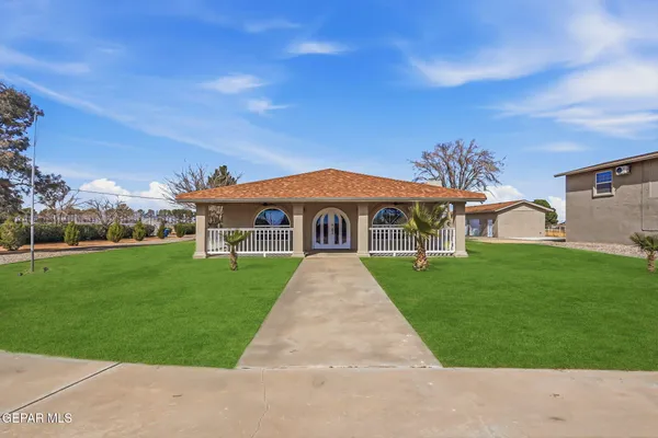 a bathroom with a sink toilet vanity and tub