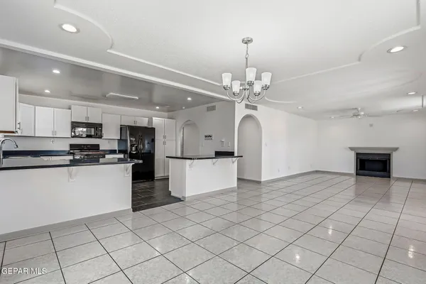 a view of a street with a building in the background