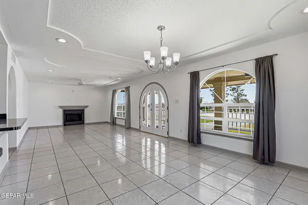 a view of swimming pool with outdoor seating