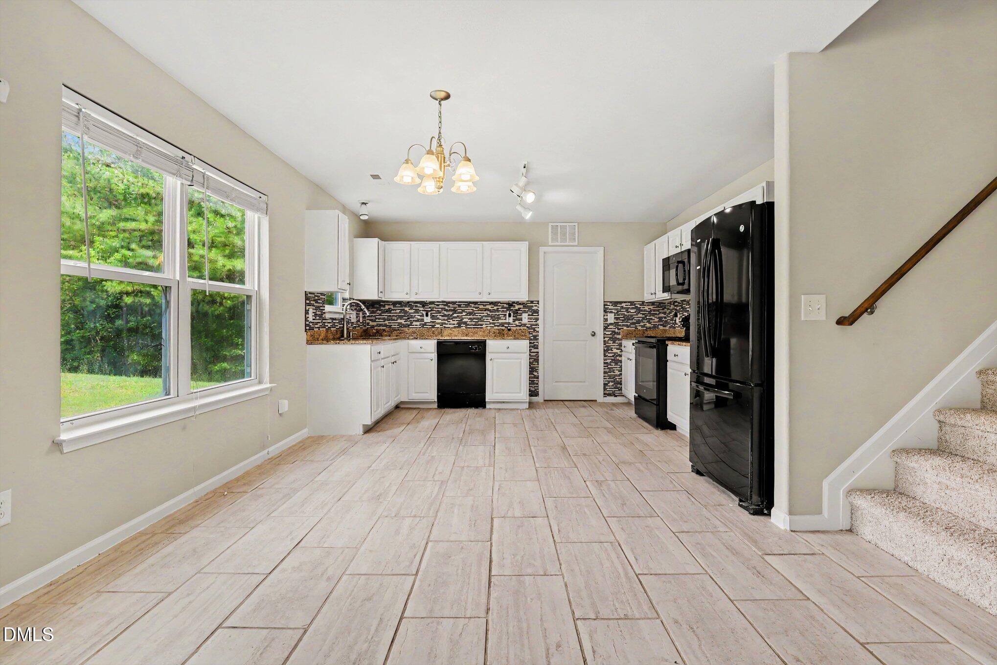 905 Woodland Road Creedmoor, NC 27522 - Photo 8 of 32 008_file_2841