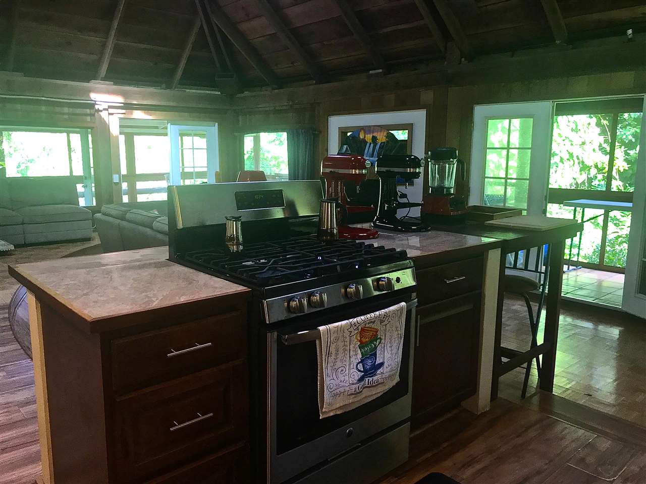 197 Honopou Road Haiku, HI 96708 - Photo 9 of 30 a kitchen with a stove and a sink