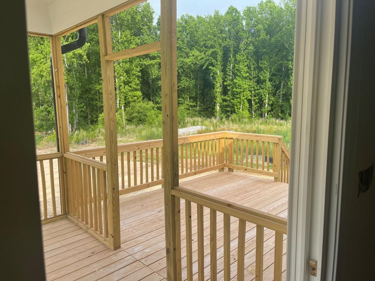8301 Running Fern Way Willow Spring, NC 27592 - Photo 13 of 13 Wood Deck and back