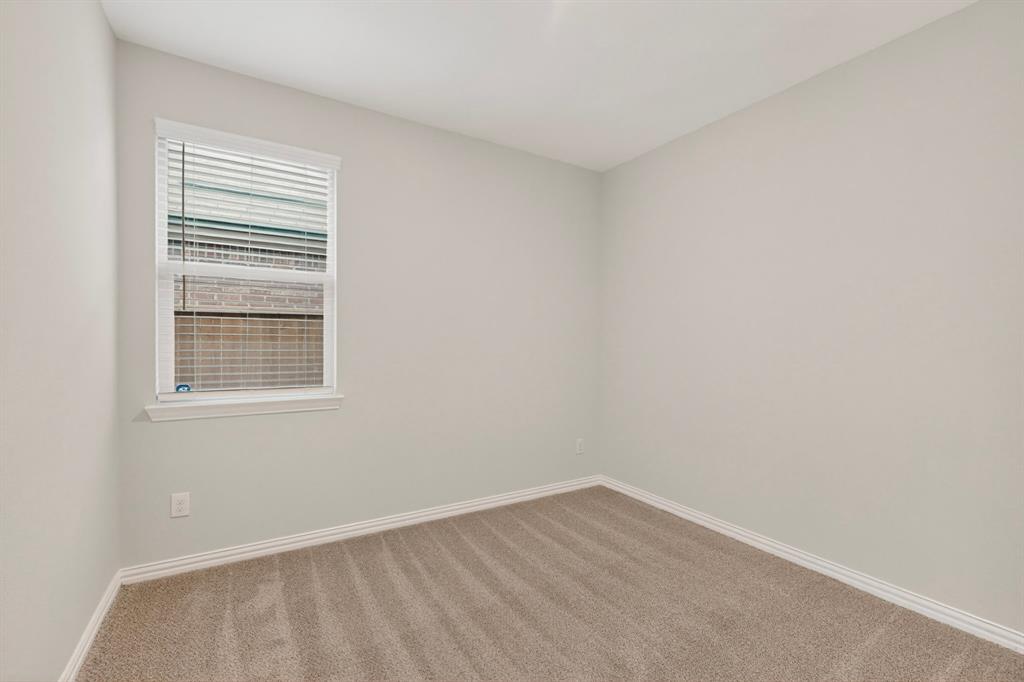3321 Riverside Drive Aubrey, TX 76227 - Photo 26 of 40 an empty room with a window