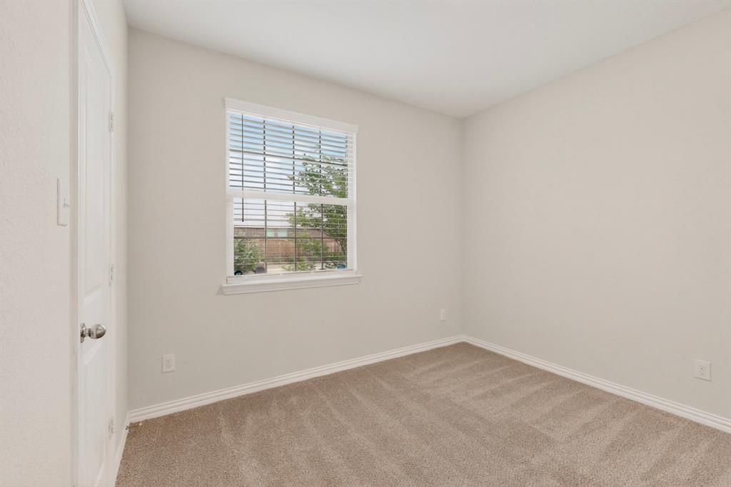 3321 Riverside Drive Aubrey, TX 76227 - Photo 29 of 40 an empty room with a window