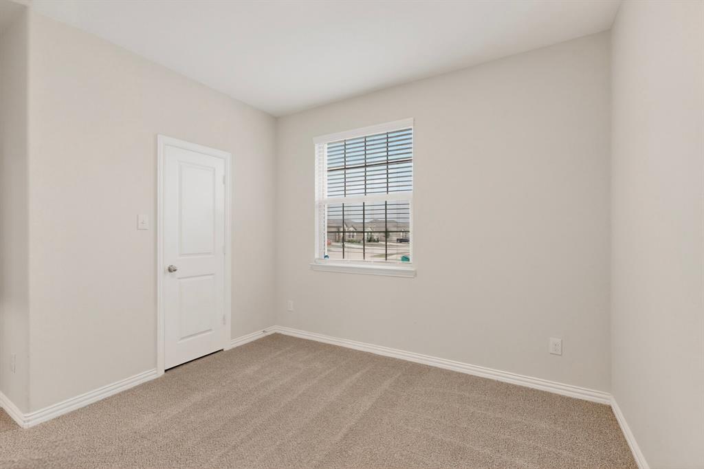 3321 Riverside Drive Aubrey, TX 76227 - Photo 30 of 40 an empty room with windows