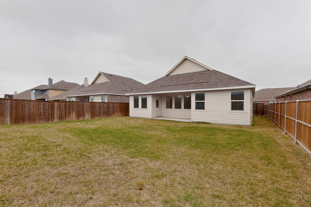 3321 Riverside Drive Aubrey, TX 76227 - Photo 35 of 40 a view of a house with a yard and sitting area