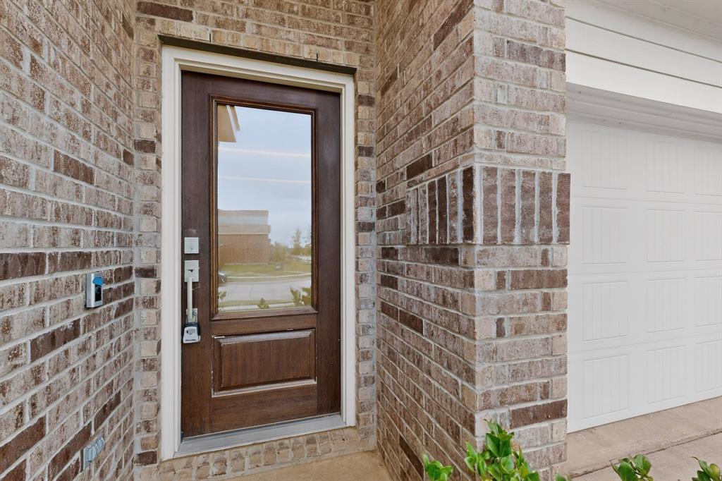 3321 Riverside Drive Aubrey, TX 76227 - Photo 5 of 40 a view of a brick wall
