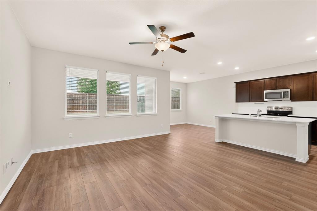 3321 Riverside Drive Aubrey, TX 76227 - Photo 8 of 40 a view of cabinets and wooden floor