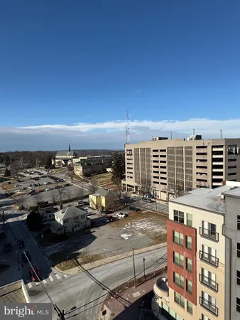 a view of a balcony with many windows
