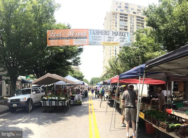 a view of street with sitting area