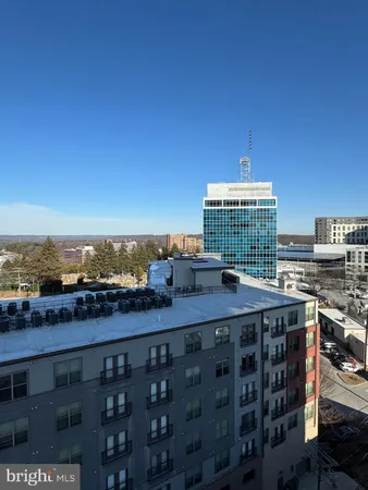 a view of a balcony with city view