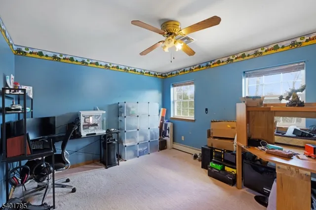 a room with furniture and fish tank